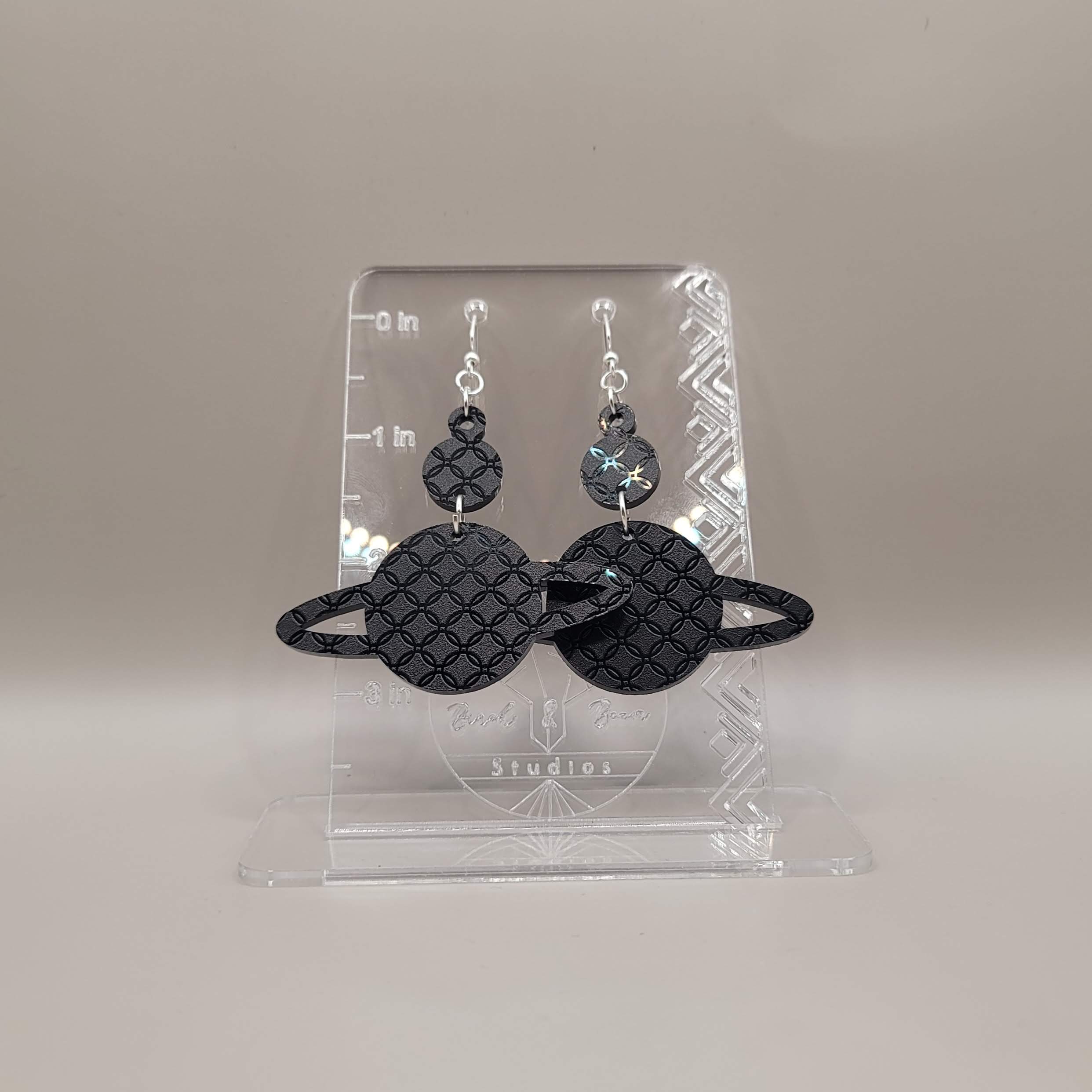 LV silver glitter earrings